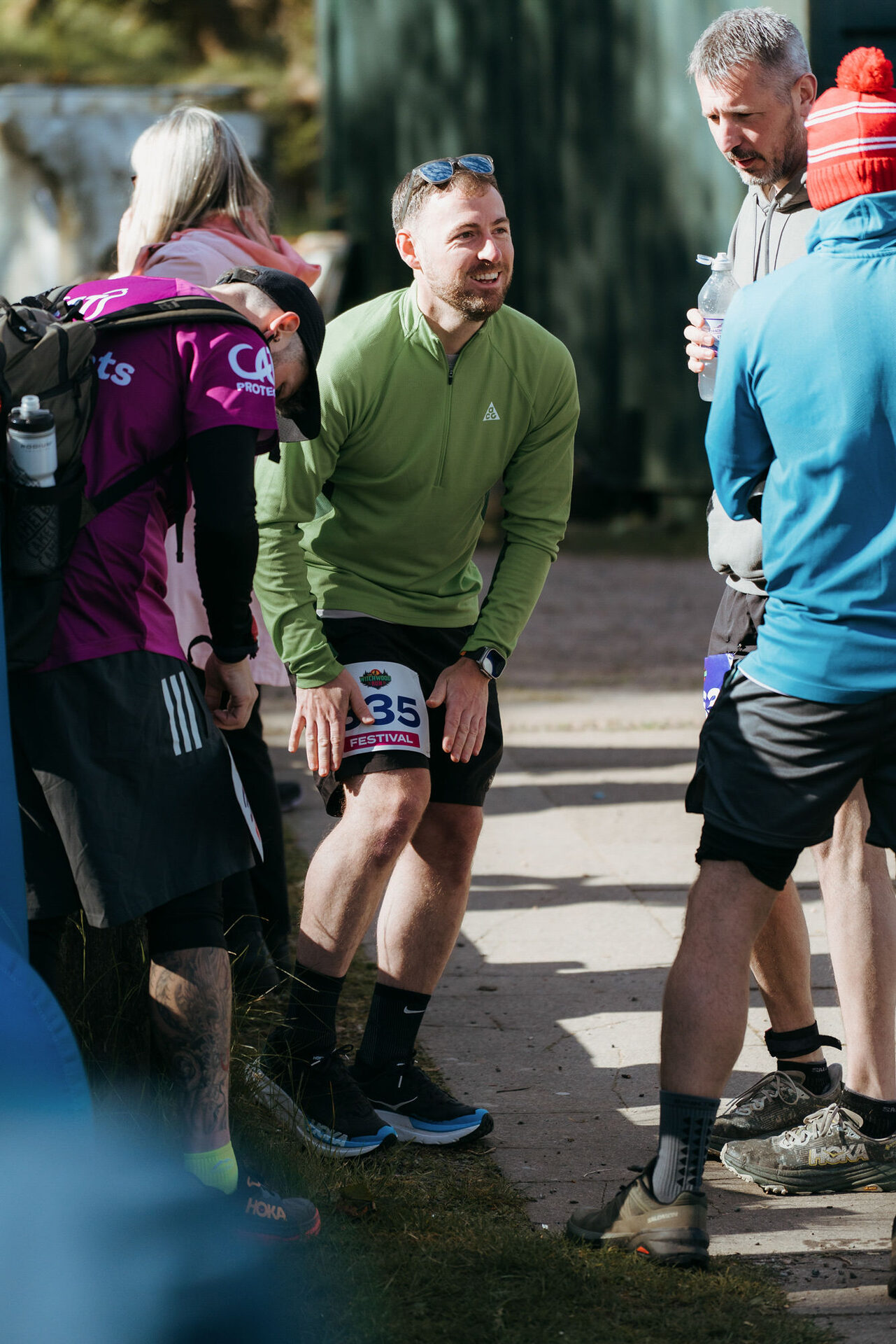 Festival runner number 535 catching his breath at the aid station